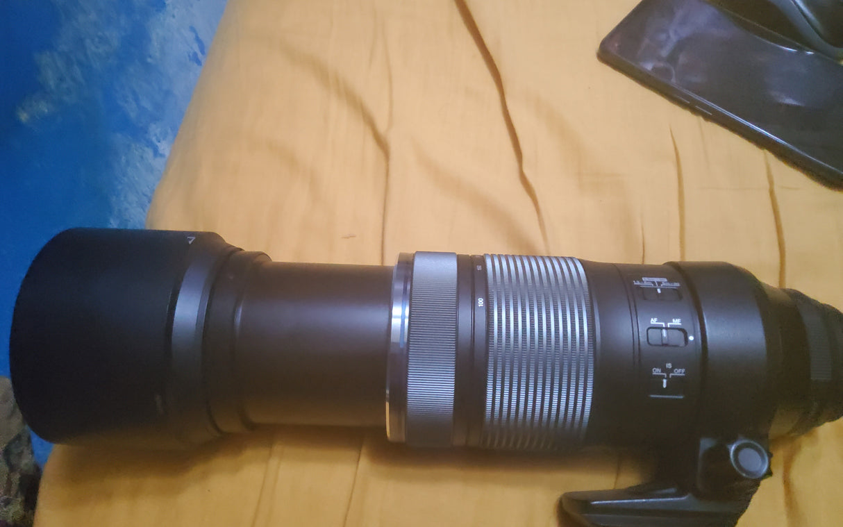 Olympus 100-400 de2dee73-e4f8-40aa-bf5c-adcfebb348f7